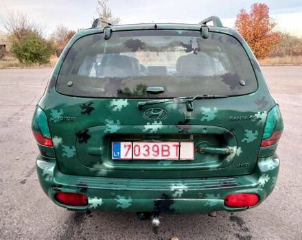 Зеленый Хендай Санта Фе, объемом двигателя 2 л и пробегом 287 тыс. км за 2750 $, фото 5 на Automoto.ua