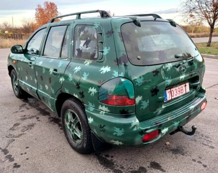 Зеленый Хендай Санта Фе, объемом двигателя 2 л и пробегом 287 тыс. км за 2750 $, фото 3 на Automoto.ua