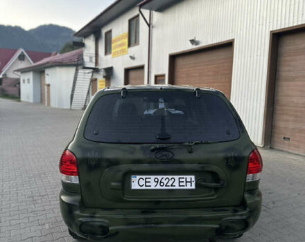 Зеленый Хендай Санта Фе, объемом двигателя 2.35 л и пробегом 223 тыс. км за 4500 $, фото 2 на Automoto.ua