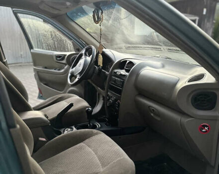 Зеленый Хендай Санта Фе, объемом двигателя 2.35 л и пробегом 223 тыс. км за 4500 $, фото 7 на Automoto.ua