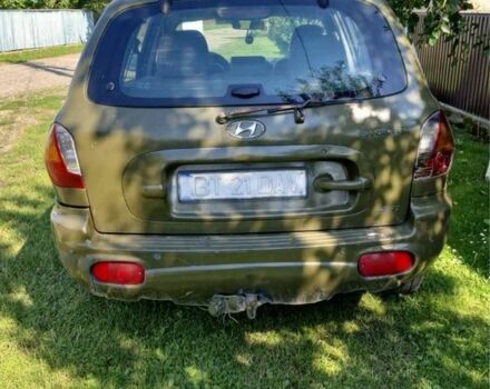 Зелений Хендай Санта Фе, об'ємом двигуна 2 л та пробігом 300 тис. км за 2041 $, фото 3 на Automoto.ua