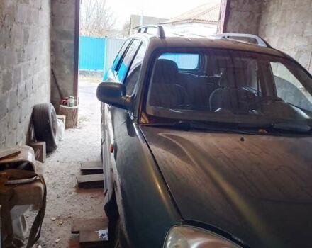 Зеленый Хендай Санта Фе, объемом двигателя 2 л и пробегом 300 тыс. км за 4200 $, фото 5 на Automoto.ua