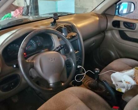 Зеленый Хендай Санта Фе, объемом двигателя 2 л и пробегом 300 тыс. км за 4200 $, фото 4 на Automoto.ua