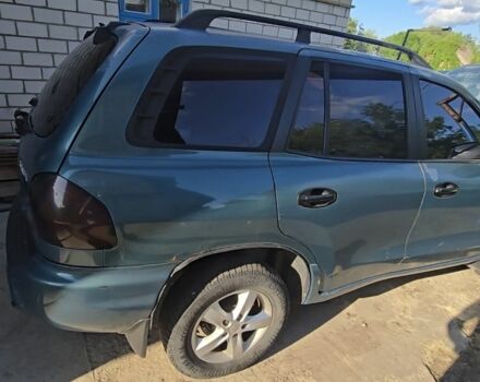 Зеленый Хендай Санта Фе, объемом двигателя 2 л и пробегом 350 тыс. км за 3349 $, фото 8 на Automoto.ua