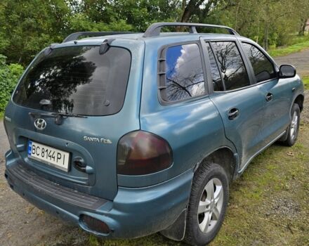 Зеленый Хендай Санта Фе, объемом двигателя 2 л и пробегом 350 тыс. км за 3349 $, фото 9 на Automoto.ua