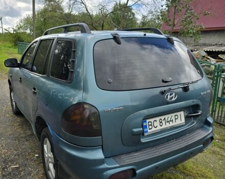 Зеленый Хендай Санта Фе, объемом двигателя 2 л и пробегом 350 тыс. км за 3349 $, фото 10 на Automoto.ua