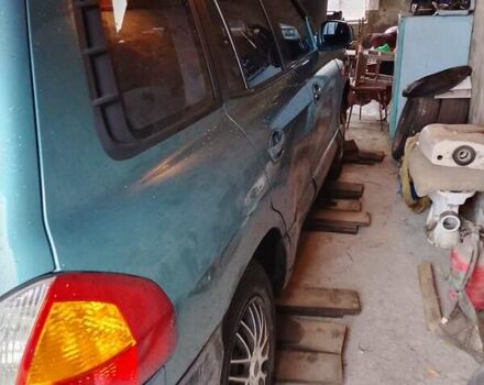 Зеленый Хендай Санта Фе, объемом двигателя 2 л и пробегом 300 тыс. км за 4200 $, фото 3 на Automoto.ua