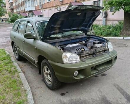 Зеленый Хендай Санта Фе, объемом двигателя 2.4 л и пробегом 225 тыс. км за 3000 $, фото 4 на Automoto.ua