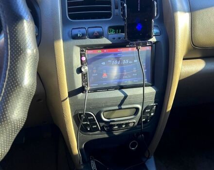 Зелений Хендай Санта Фе, об'ємом двигуна 2 л та пробігом 388 тис. км за 4500 $, фото 8 на Automoto.ua