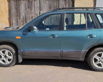 Зеленый Хендай Санта Фе, объемом двигателя 2 л и пробегом 125 тыс. км за 2999 $, фото 4 на Automoto.ua