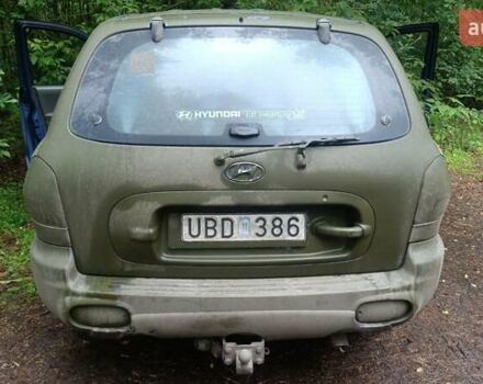 Зеленый Хендай Санта Фе, объемом двигателя 2.4 л и пробегом 225 тыс. км за 3000 $, фото 11 на Automoto.ua