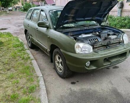 Зеленый Хендай Санта Фе, объемом двигателя 2.4 л и пробегом 225 тыс. км за 3000 $, фото 14 на Automoto.ua