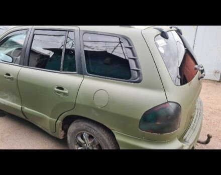 Зеленый Хендай Санта Фе, объемом двигателя 2 л и пробегом 284 тыс. км за 2900 $, фото 4 на Automoto.ua