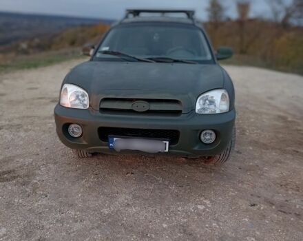 Зеленый Хендай Санта Фе, объемом двигателя 2 л и пробегом 336 тыс. км за 3500 $, фото 2 на Automoto.ua