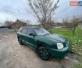 Зеленый Хендай Санта Фе, объемом двигателя 2 л и пробегом 278 тыс. км за 3116 $, фото 1 на Automoto.ua