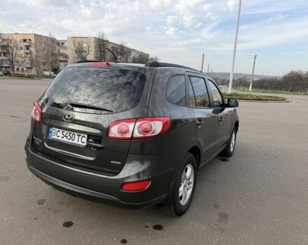 Зеленый Хендай Санта Фе, объемом двигателя 2.4 л и пробегом 180 тыс. км за 9800 $, фото 6 на Automoto.ua