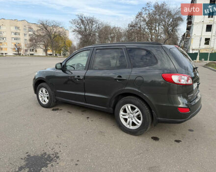 Зеленый Хендай Санта Фе, объемом двигателя 2.36 л и пробегом 180 тыс. км за 9800 $, фото 4 на Automoto.ua