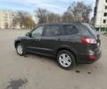 Зеленый Хендай Санта Фе, объемом двигателя 2.4 л и пробегом 180 тыс. км за 9800 $, фото 4 на Automoto.ua