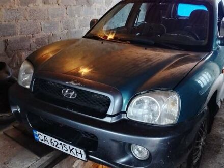 Зеленый Хендай Санта Фе, объемом двигателя 2 л и пробегом 300 тыс. км за 4200 $, фото 1 на Automoto.ua