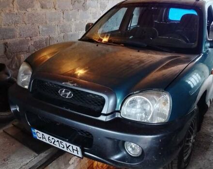 Зеленый Хендай Санта Фе, объемом двигателя 2 л и пробегом 300 тыс. км за 4200 $, фото 1 на Automoto.ua