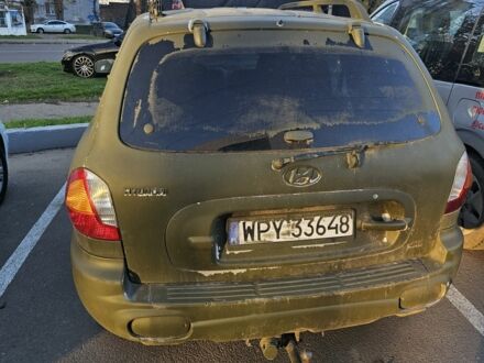 Зеленый Хендай Санта Фе, объемом двигателя 2 л и пробегом 270 тыс. км за 3000 $, фото 1 на Automoto.ua