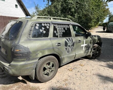Зелений Хендай Санта Фе, об'ємом двигуна 2.7 л та пробігом 370 тис. км за 2424 $, фото 1 на Automoto.ua