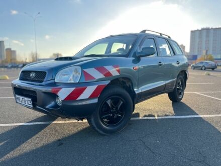 Зеленый Хендай Санта Фе, объемом двигателя 2 л и пробегом 126 тыс. км за 3000 $, фото 1 на Automoto.ua