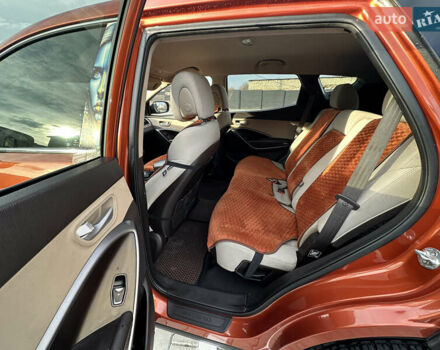 Оранжевый Хендай Санта Фе, объемом двигателя 2.4 л и пробегом 208 тыс. км за 15800 $, фото 13 на Automoto.ua