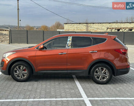Оранжевый Хендай Санта Фе, объемом двигателя 2.4 л и пробегом 208 тыс. км за 15800 $, фото 4 на Automoto.ua