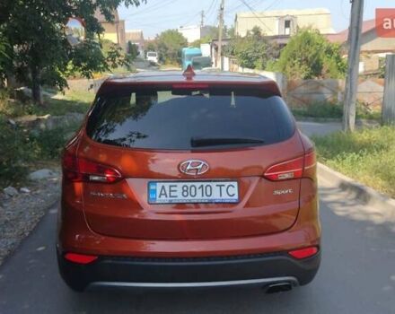 Оранжевый Хендай Санта Фе, объемом двигателя 2.4 л и пробегом 90 тыс. км за 14000 $, фото 1 на Automoto.ua