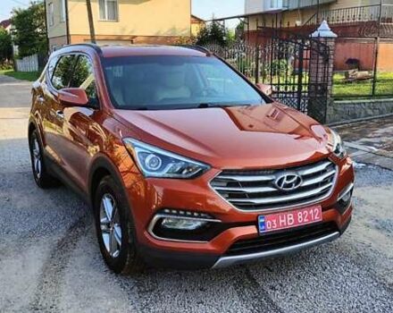 Оранжевый Хендай Санта Фе, объемом двигателя 2.4 л и пробегом 163 тыс. км за 16500 $, фото 2 на Automoto.ua