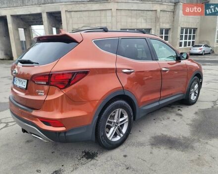 Оранжевый Хендай Санта Фе, объемом двигателя 2.36 л и пробегом 135 тыс. км за 15500 $, фото 5 на Automoto.ua