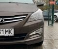 Коричневый Хендай Соларис, объемом двигателя 1.6 л и пробегом 122 тыс. км за 11499 $, фото 6 на Automoto.ua