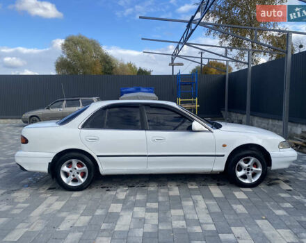 Белый Хендай Соната, объемом двигателя 2 л и пробегом 330 тыс. км за 1700 $, фото 2 на Automoto.ua