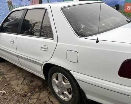 Белый Хендай Соната, объемом двигателя 2 л и пробегом 237 тыс. км за 1000 $, фото 3 на Automoto.ua