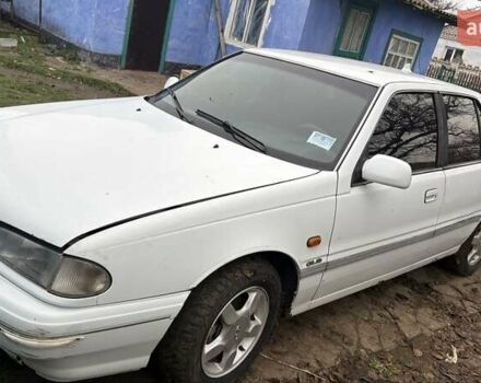 Белый Хендай Соната, объемом двигателя 2 л и пробегом 237 тыс. км за 1000 $, фото 1 на Automoto.ua