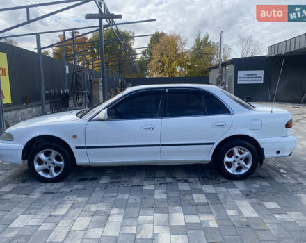 Белый Хендай Соната, объемом двигателя 2 л и пробегом 330 тыс. км за 1700 $, фото 1 на Automoto.ua