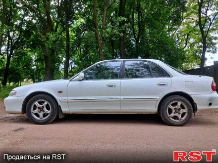 Хендай Соната 1997 в Кропивницком (Кировограде) на Automoto.ua Белый Хендай Соната, объемом двигателя 2 л и пробегом 300 тыс. км за 1999 $, фото 1 на Automoto.ua