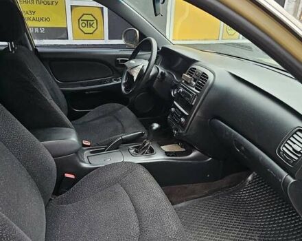 Бежевый Хендай Соната, объемом двигателя 2 л и пробегом 200 тыс. км за 1800 $, фото 20 на Automoto.ua