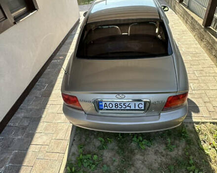 Бежевый Хендай Соната, объемом двигателя 2 л и пробегом 236 тыс. км за 4200 $, фото 2 на Automoto.ua