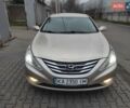 Бежевый Хендай Соната, объемом двигателя 2 л и пробегом 160 тыс. км за 5499 $, фото 1 на Automoto.ua