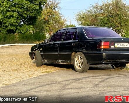 Черный Хендай Соната, объемом двигателя 2 л и пробегом 200 тыс. км за 950 $, фото 4 на Automoto.ua