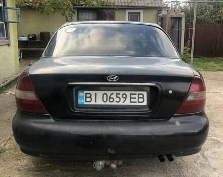 Чорний Хендай Соната, об'ємом двигуна 2 л та пробігом 400 тис. км за 2000 $, фото 4 на Automoto.ua