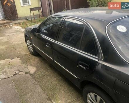 Чорний Хендай Соната, об'ємом двигуна 2 л та пробігом 400 тис. км за 2000 $, фото 5 на Automoto.ua