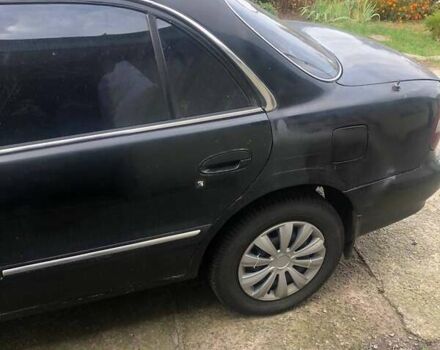 Чорний Хендай Соната, об'ємом двигуна 2 л та пробігом 400 тис. км за 2000 $, фото 7 на Automoto.ua