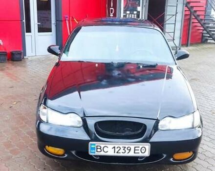 Черный Хендай Соната, объемом двигателя 2 л и пробегом 200 тыс. км за 1350 $, фото 10 на Automoto.ua