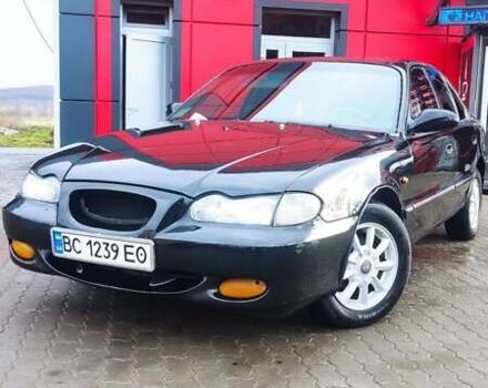 Черный Хендай Соната, объемом двигателя 2 л и пробегом 200 тыс. км за 1350 $, фото 4 на Automoto.ua