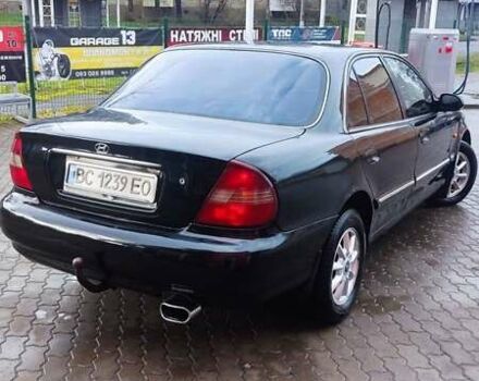 Черный Хендай Соната, объемом двигателя 2 л и пробегом 200 тыс. км за 1450 $, фото 9 на Automoto.ua