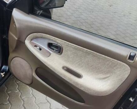 Черный Хендай Соната, объемом двигателя 2 л и пробегом 200 тыс. км за 1450 $, фото 16 на Automoto.ua