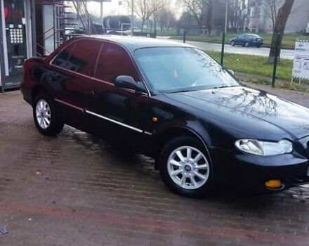 Черный Хендай Соната, объемом двигателя 2 л и пробегом 200 тыс. км за 1350 $, фото 9 на Automoto.ua